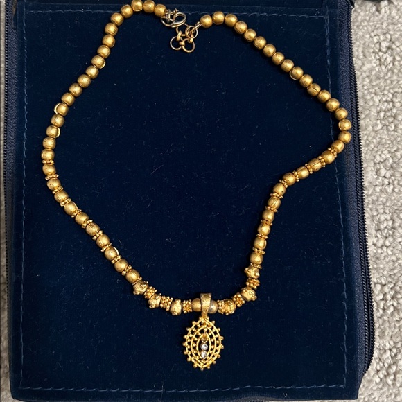 Jewelry - Elegant Gold Beaded Necklace with Pendant